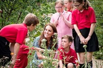 HRH Duchess Of Cambridge with children in the Back To Nature Garden