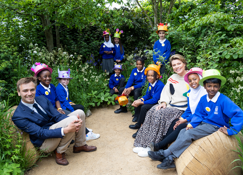 Jamie Butterworth, Kate Silverton, and pupils from Viking Primary School in the garden