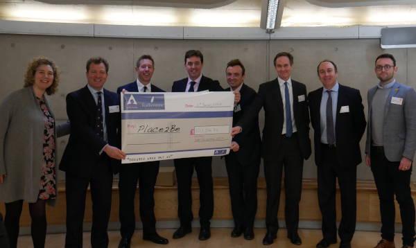 Some of the heads visited a Place2Be school to present us with their donation (giant cheque).