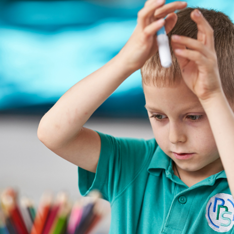 Boy with pen