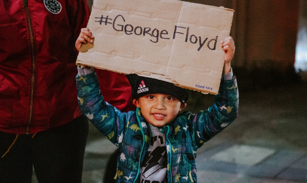 Boy protesting for George Floyd