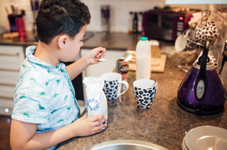 Boy making tea