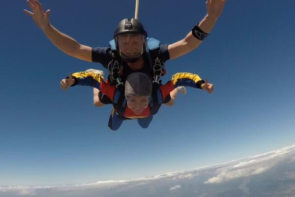 Andrea skydiving mid-air