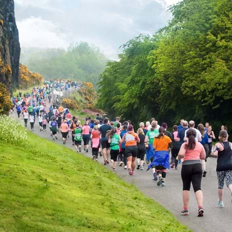 People running along path in Scotland