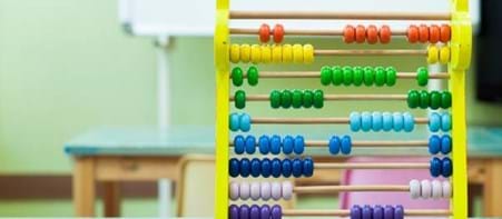 colourful abacus on school desk