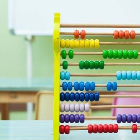 colourful abacus on school desk