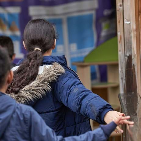 school children playing in playground