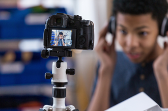 boy recording himself on camera