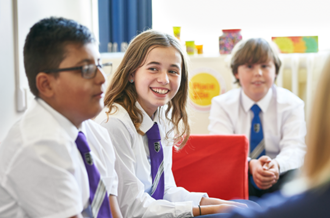 three secondary age pupils speaking