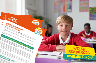 Photo of blonde boy in classroom, with overlaid graphics showing welsh resources and text that reads 'Welsh resources available now'