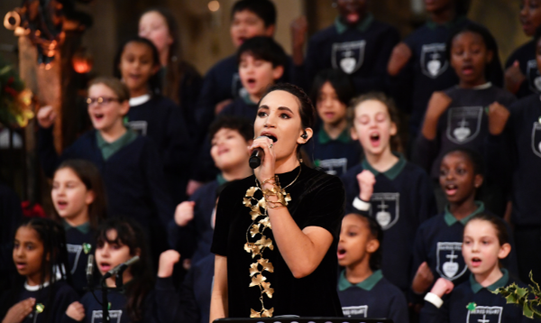 Laura Wright performs with the choir from Sacred Heart Catholic Primary School