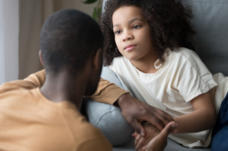 Father and child having a conversation