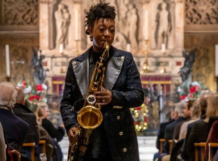 YolanDa Brown performing at a Place2Be Carol Concert