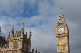 Photo of Big Ben and Houses of Parliament, with a cloudy sky