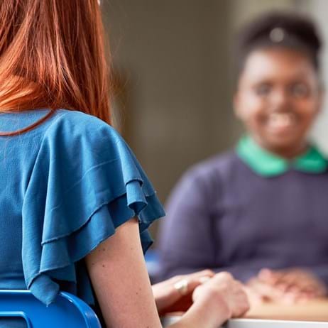 Counsellor talking to child