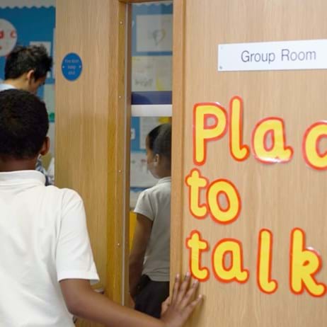 Child walking into counselling room
