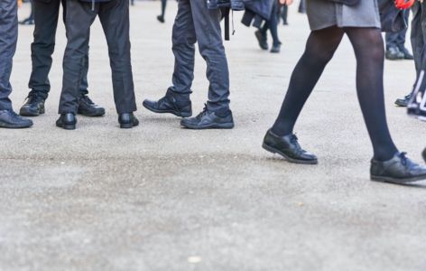 Children's feet in school playground