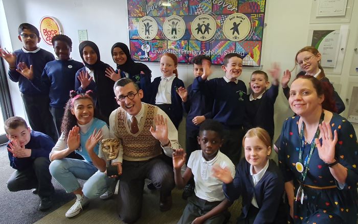 Alishea Campbell-Drummond and Ben Shires with Children at Lewis Street Primary and Place School Project Manager, Louisa Hodgson