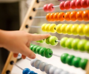 Child playing with an abacus