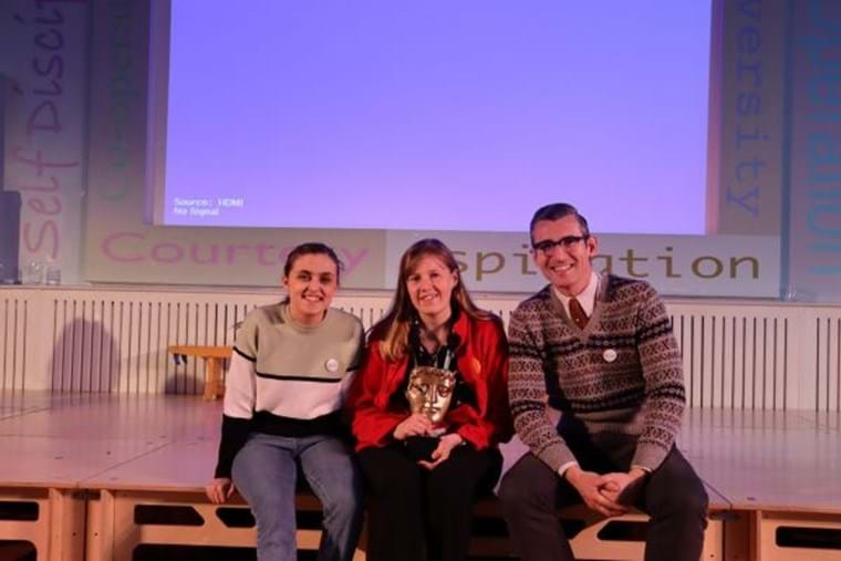 Kia Pegg and Ben Shires with Hayley Lake, Place2Be School Project Manager at Featherstone Primary School