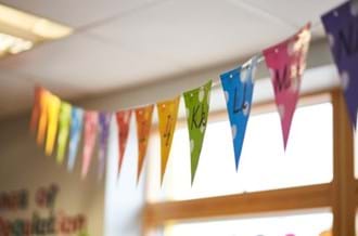 Pride Month rainbow bunting in classroom