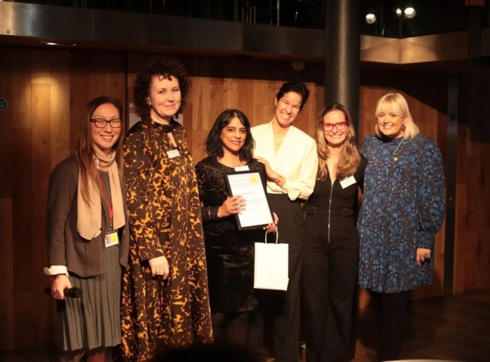 Place2Be staff including Chief Executive Catherine Roche, alongside Place2Be Ambassador Katie Thistleton and a 2023 graduate at the ceremony. 
