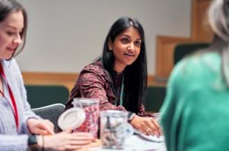 Adults taking part in a creative activity