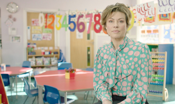 Kate Silverton sitting in classroom