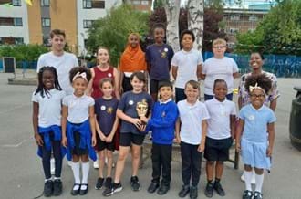 Pupils from Allen Edwards Primary School in Lambeth standing with Sam Homewood, Shanequa Paris, and Jessica Ransom as part of their BAFTA Roadshow visit.
