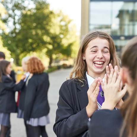 Girls playing clapping game