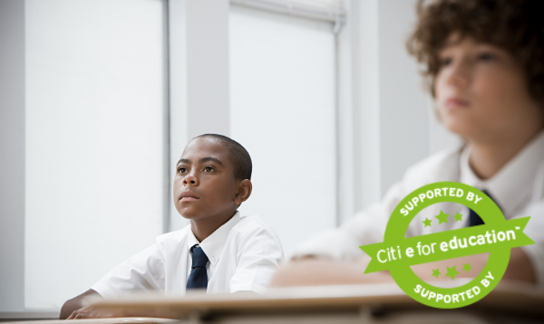 Two boys in classroom. Text saying 'supported by citi e for education'.