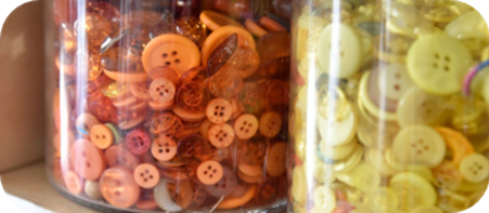 Jars of colourful buttons