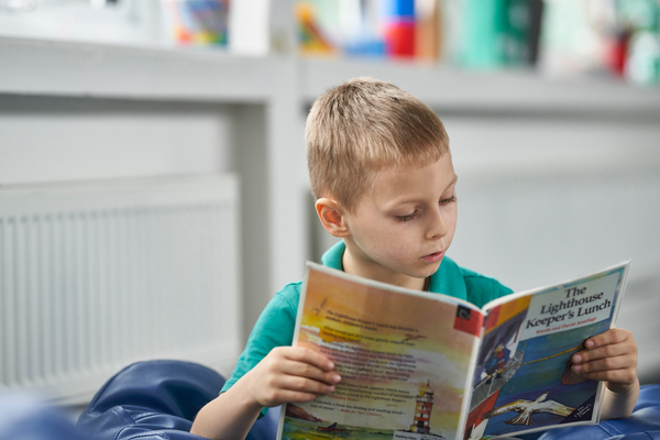 Boy reading a magazine