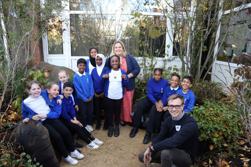 Viking Primary School pupils their Head Teacher Miss Amie Norris, and Jamie Butterworth