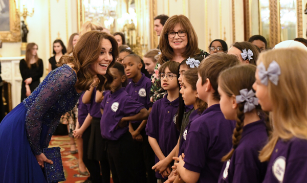 The Duchess of Cambridge meets children