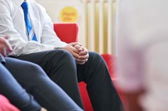 young person sat in Place2Be therapy room