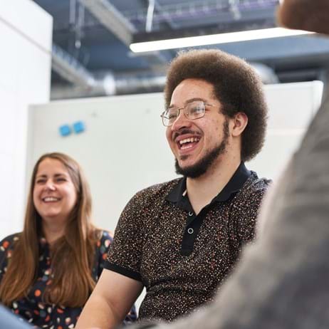 Adults laughing in training